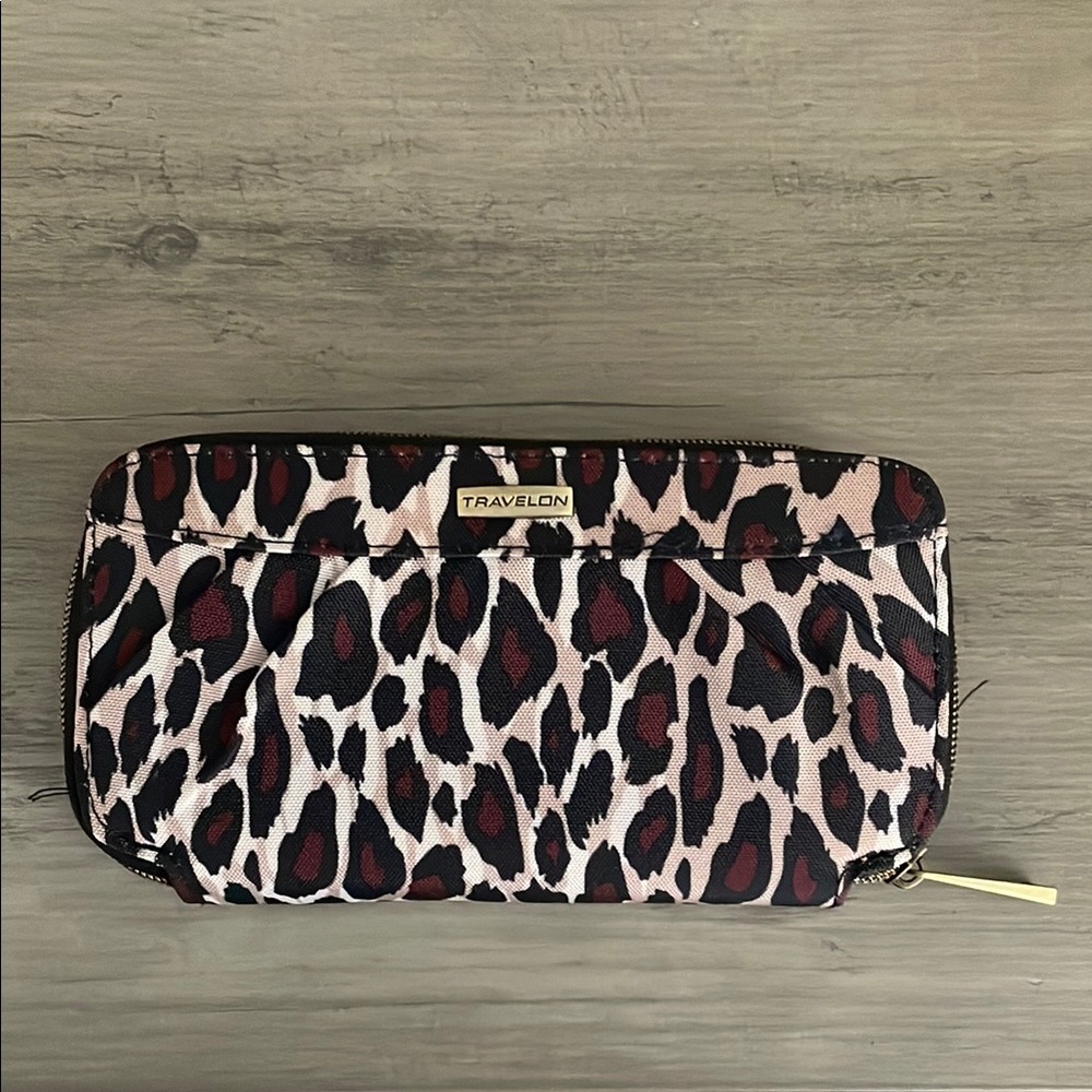 Travelon Black and Brown ID protection wallet.  with Animal Print